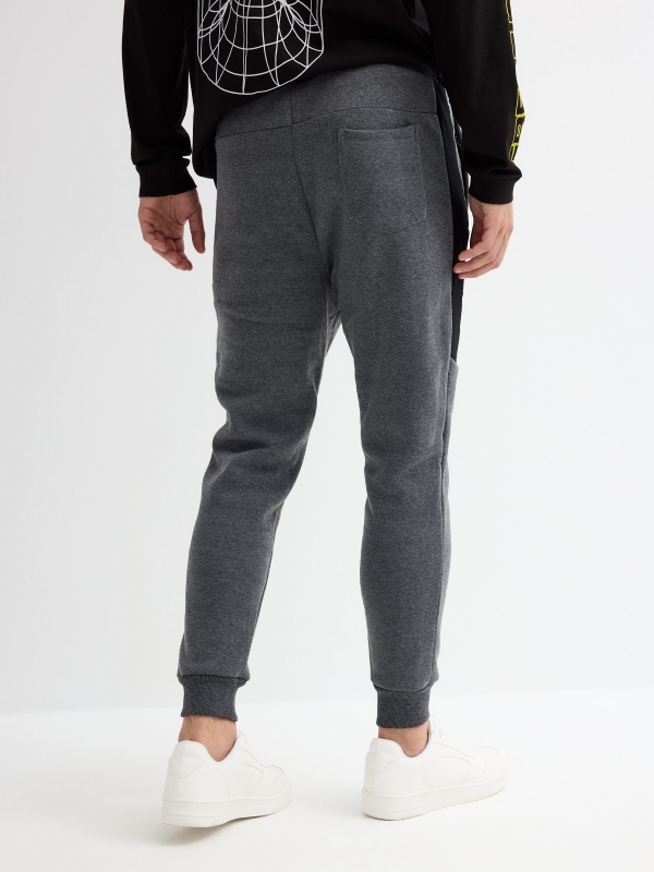 Grey sport jogger trousers dark melange middle back view