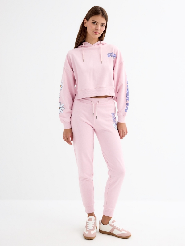 Pink printed jogger pants light pink front view