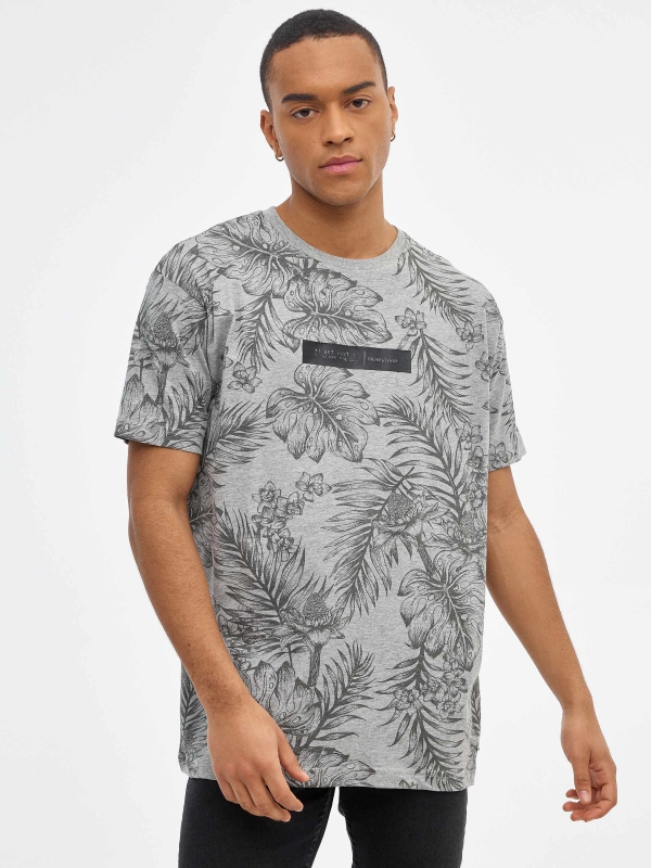 T-shirt de impressão tropical com gráfico cinza vista meia frontal