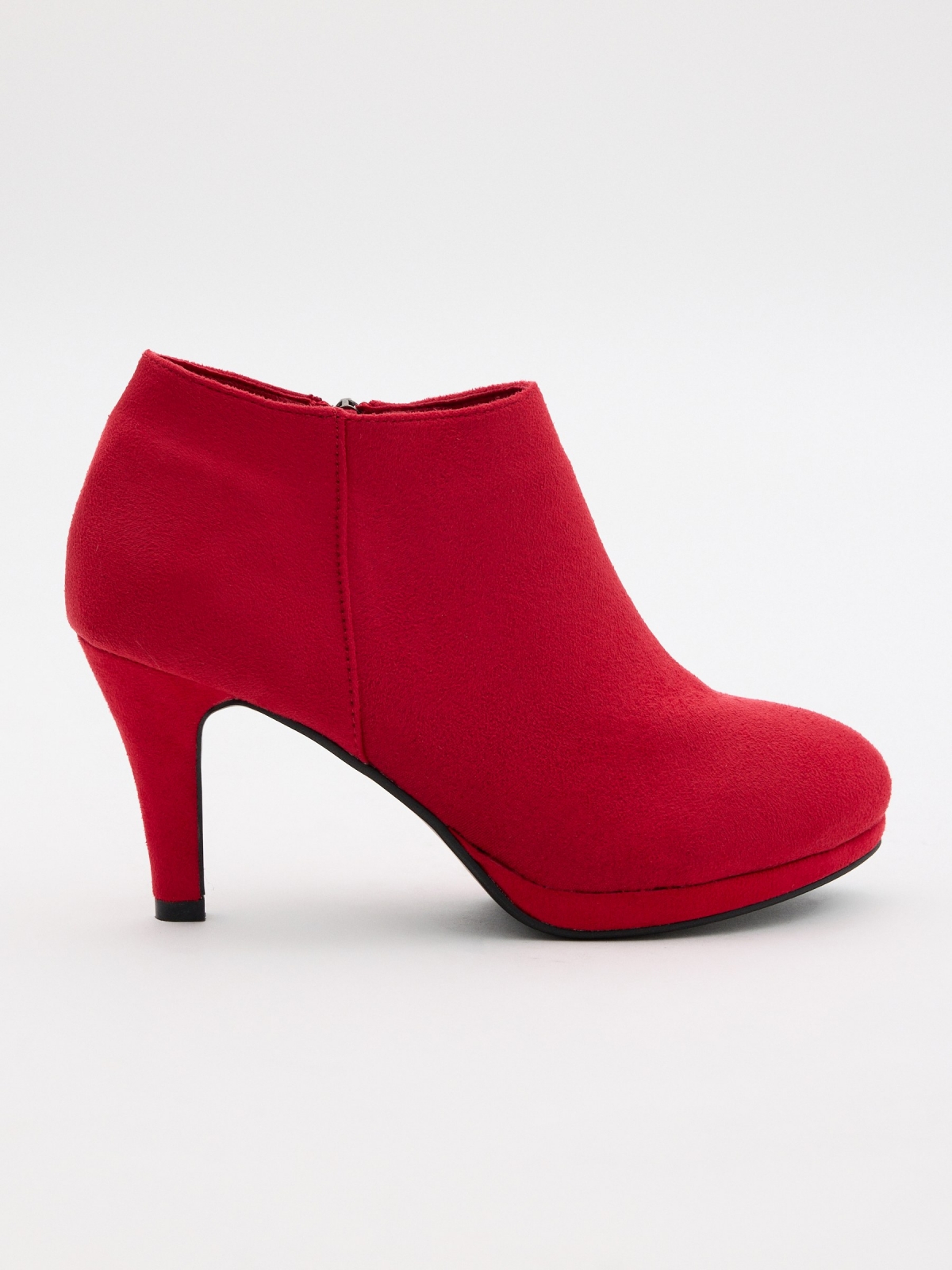 Red suede heeled pumps