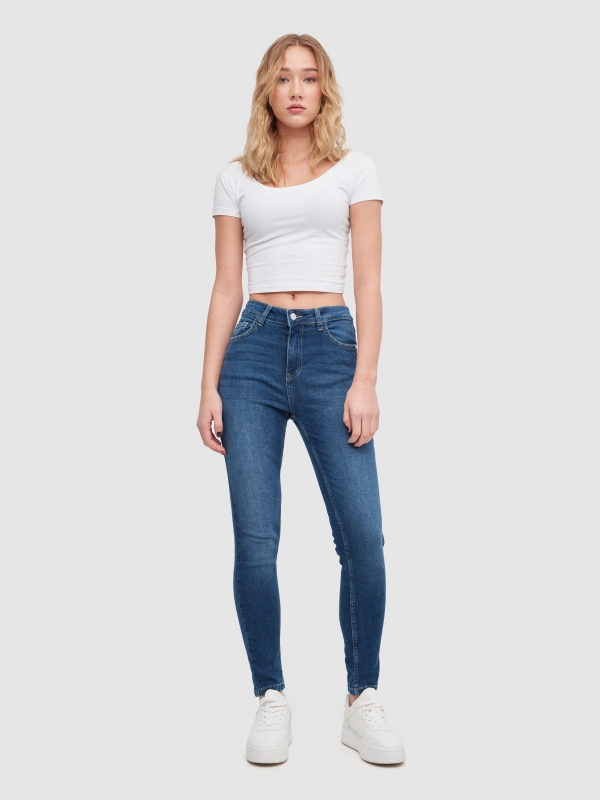 Jeans skinny tiro medio desgastados