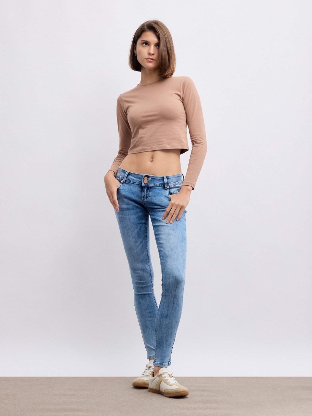 Low rise washed effect skinny jeans