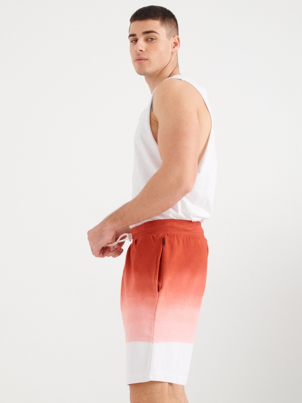 Gradient effect Bermuda shorts orangish red detail view