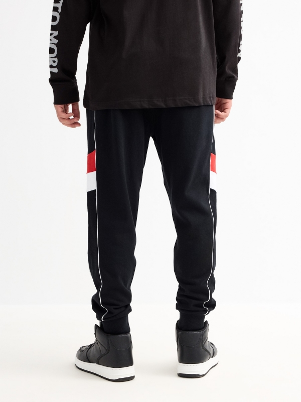 Jogger pants with mixed details black middle back view