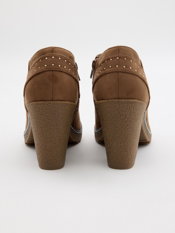 Camel heeled ankle boots with studs brown detail view