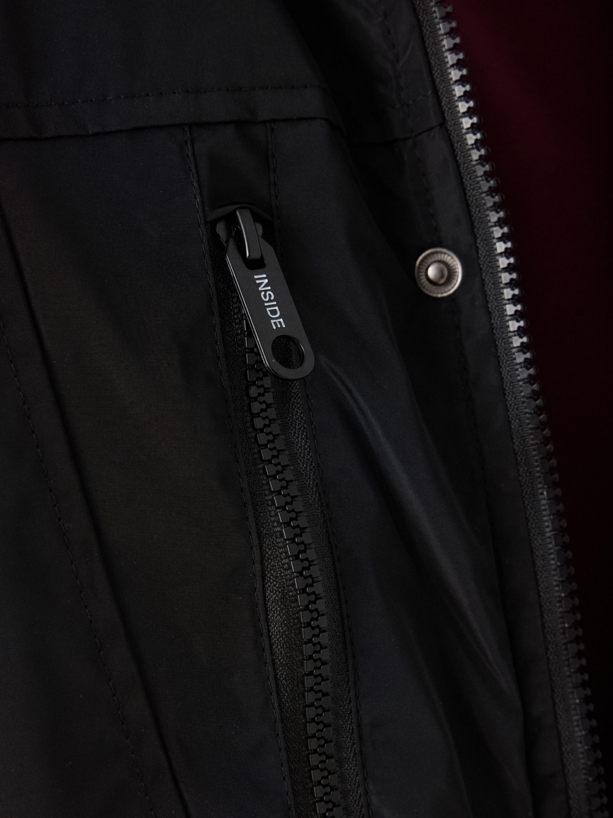 Hooded black parka black detail view