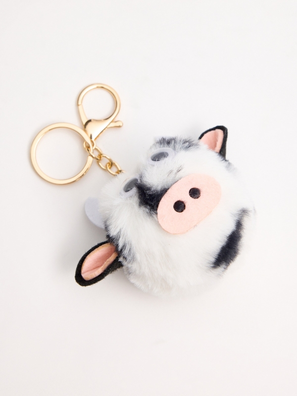 Cow pompom keychain aerial view