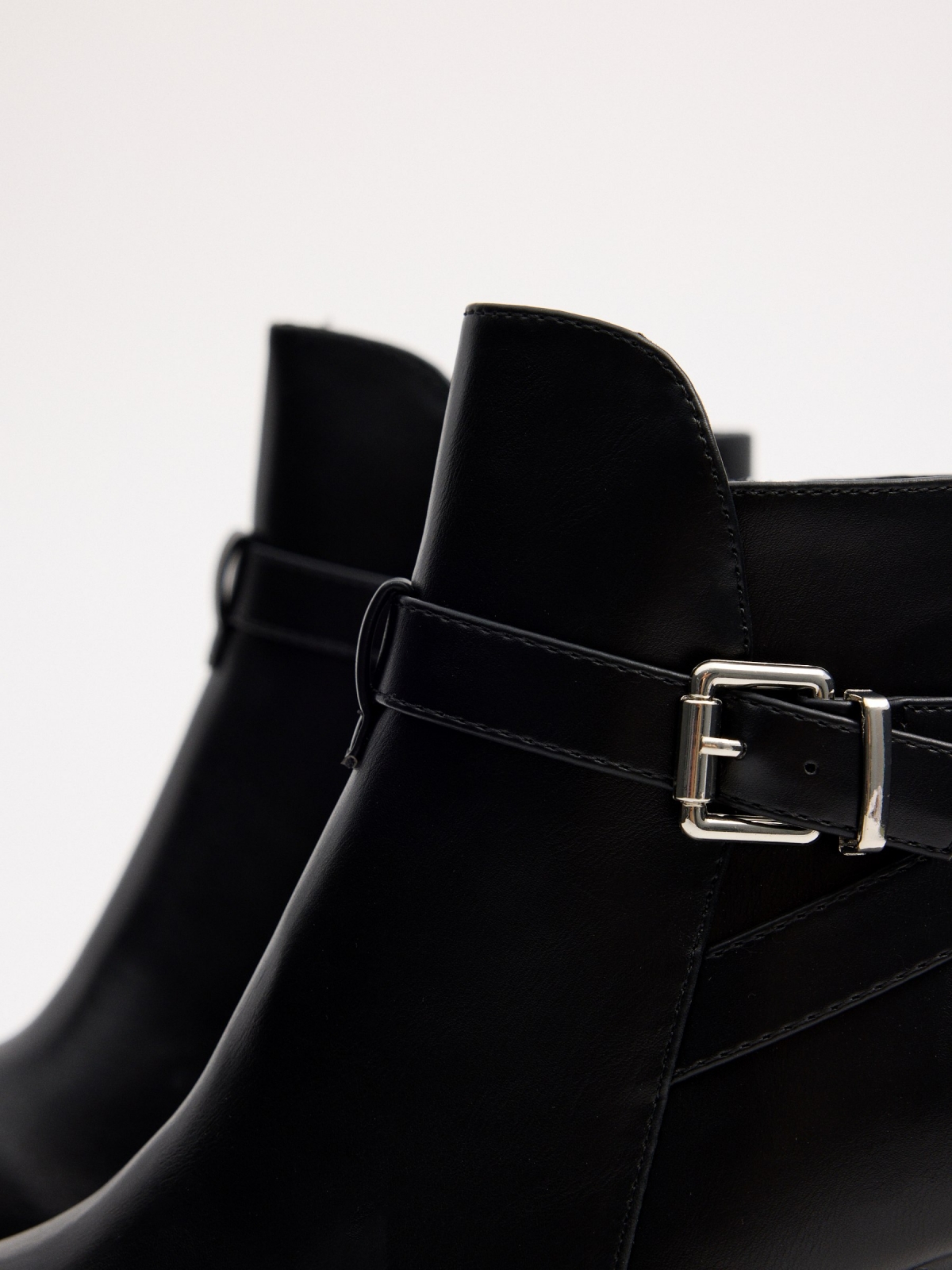 Black ankle boots with buckle heel black detail view