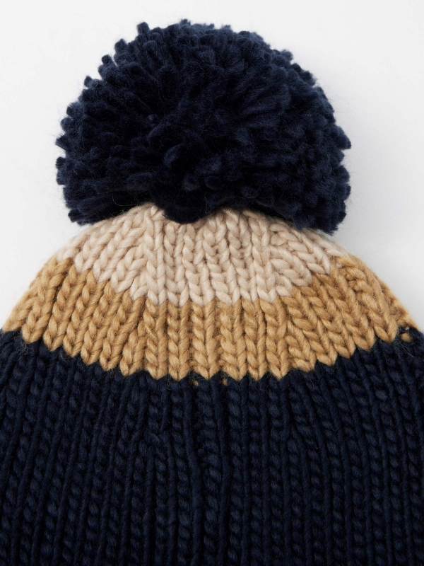 Chunky knit pom pom hat navy detail view