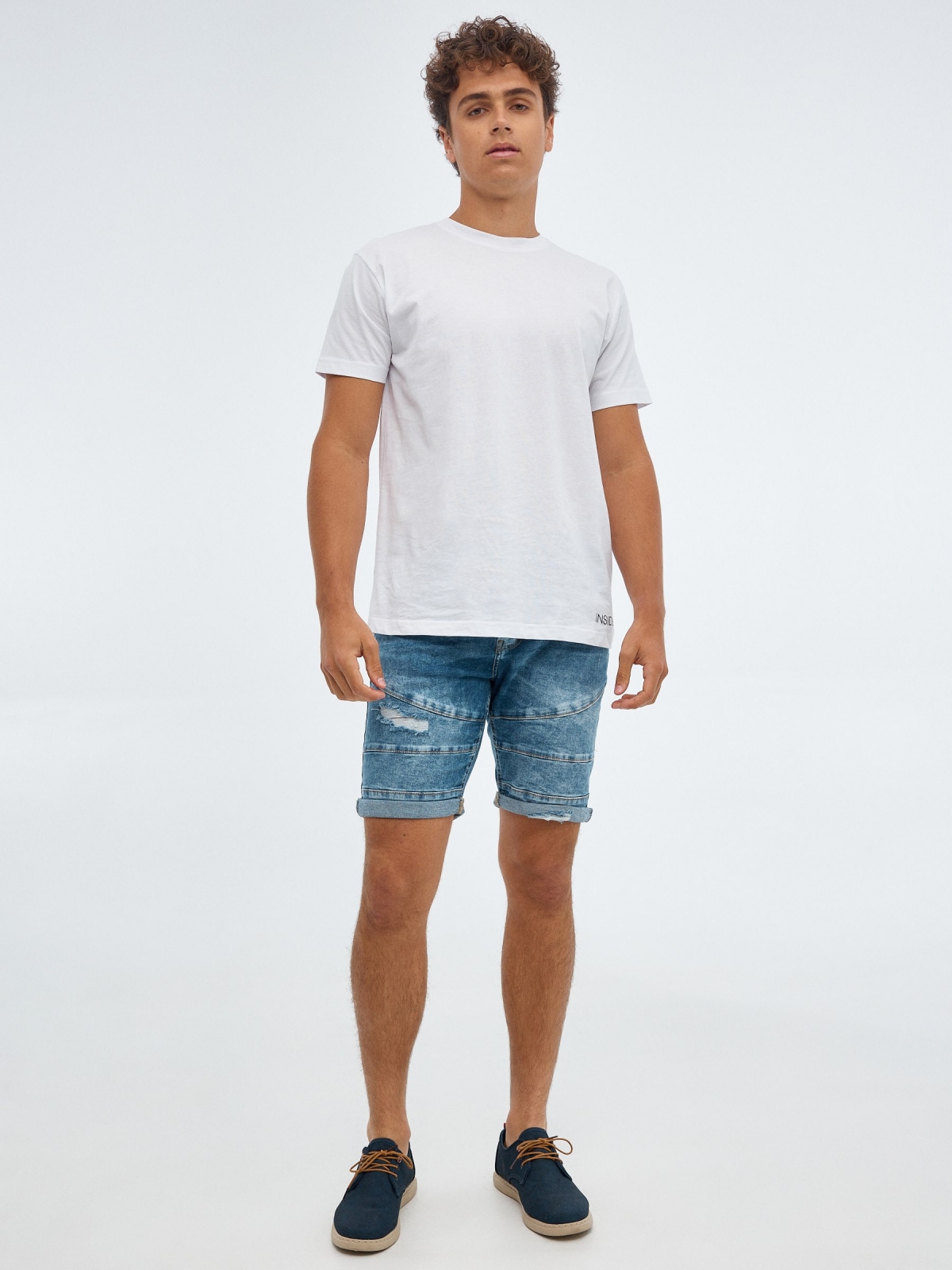 Washed blue denim Bermuda shorts blue front view