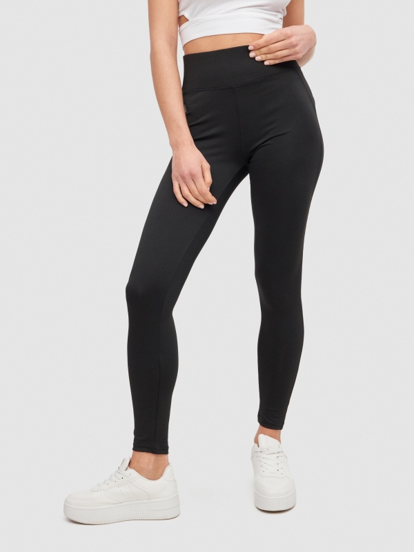 Leggings negros de tiro alto negro vista media frontal