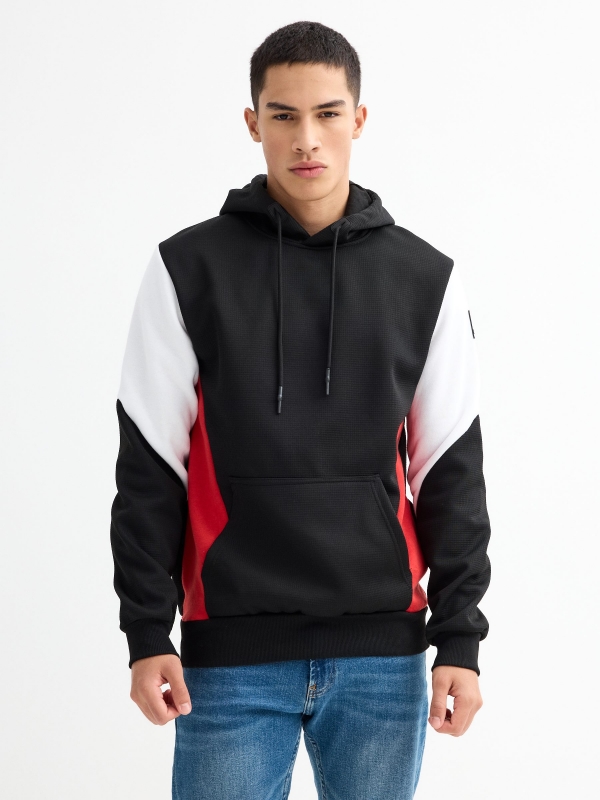 Hoodie color block com bolso preto vista meia frontal