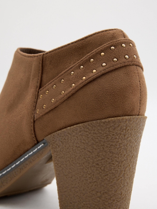 Camel heeled ankle boots with studs brown detail view