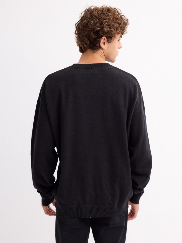 Text knit sweater black middle back view