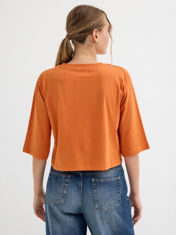 T-shirt with print orange middle back view