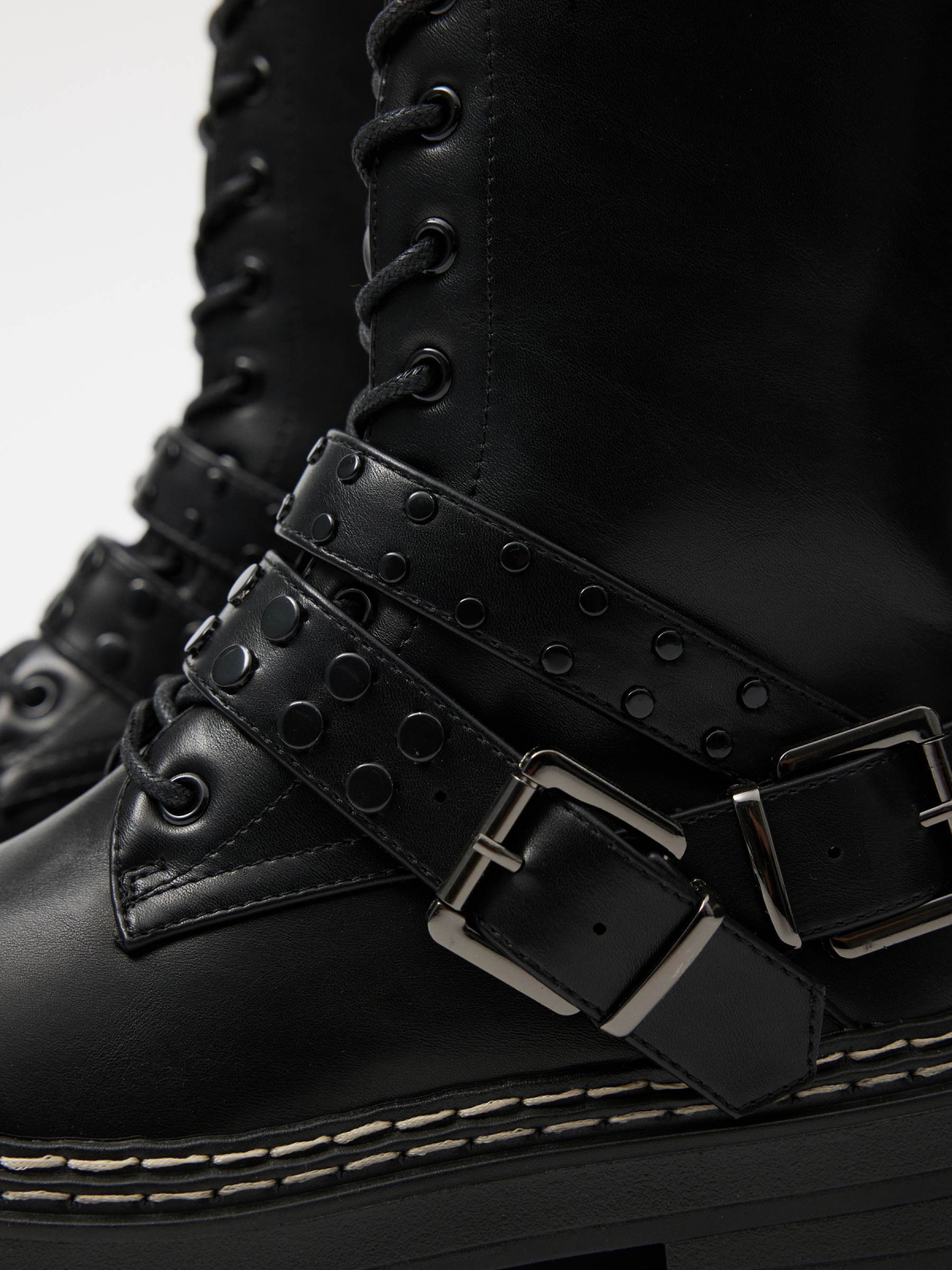 Ankle boot with studded straps black detail view