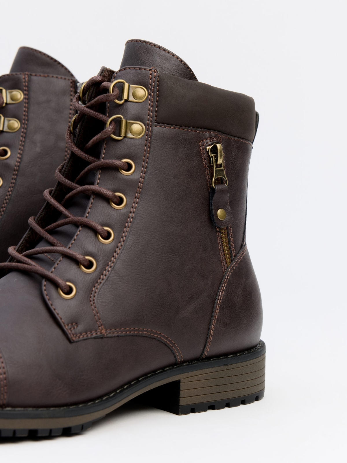 Brown military boot with zipper detail earth brown detail view