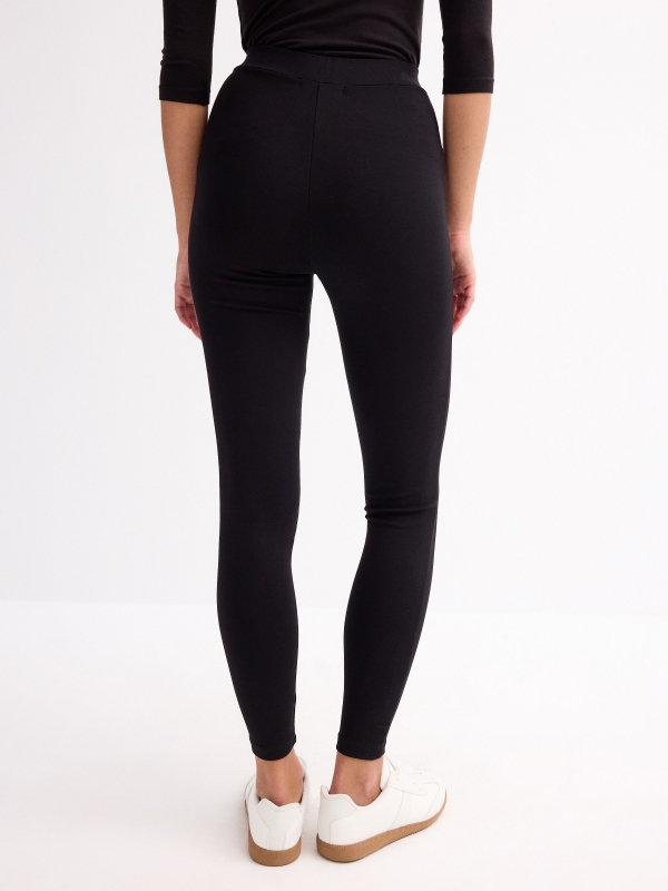 Legging cintura alta com zíper preto vista meia traseira