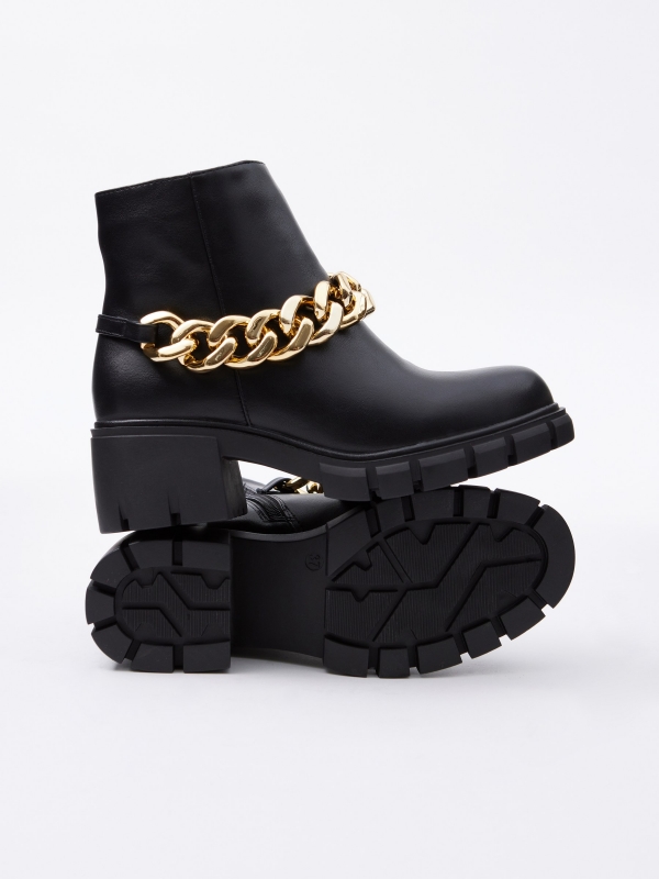 Golden chain high heel ankle boot black detail view