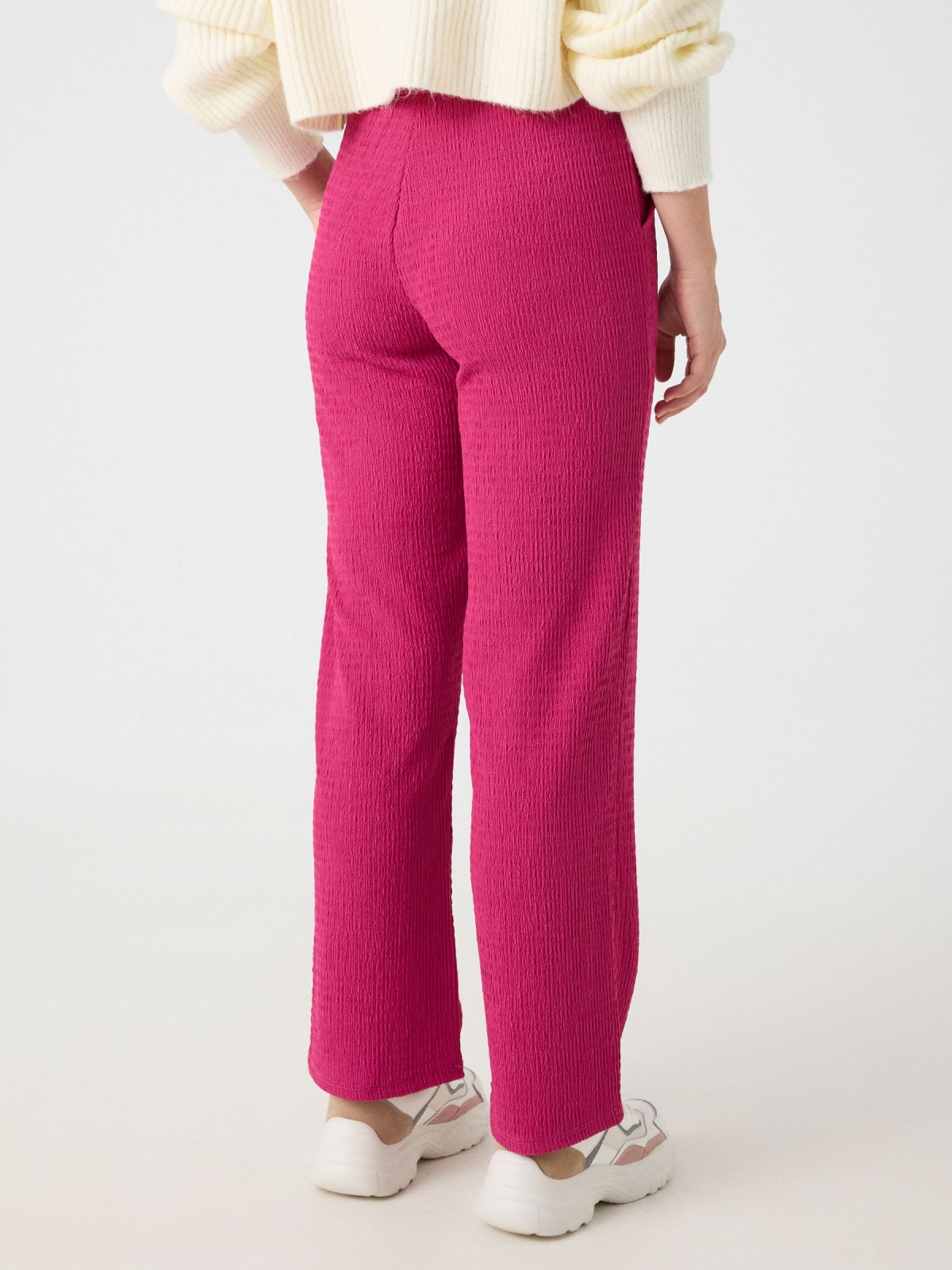 Textured black wide leg pantalon fuchsia middle back view