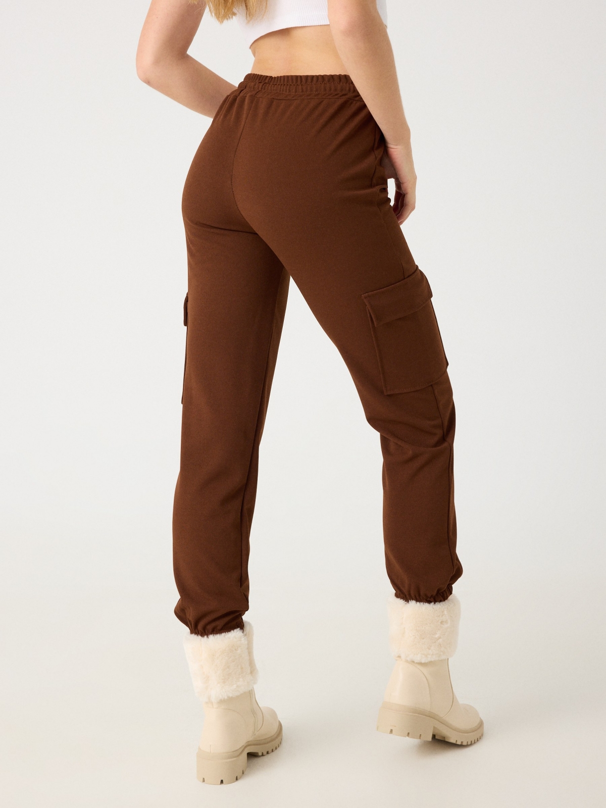 Rubber cargo pants brown middle back view