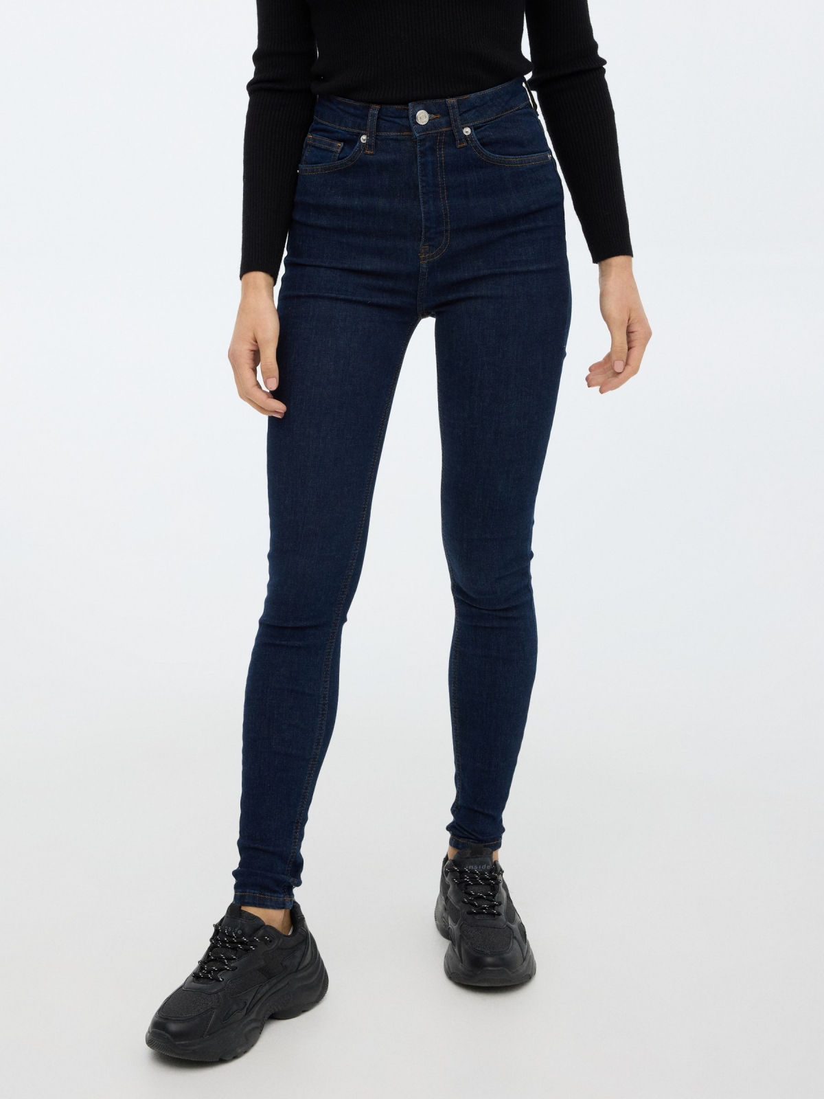 Jeans skinny tiro alto azul oscuro vista media frontal