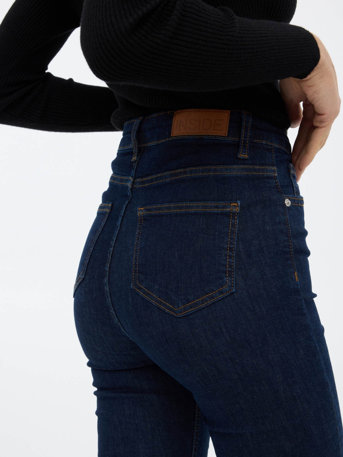 High rise skinny jeans dark blue detail view