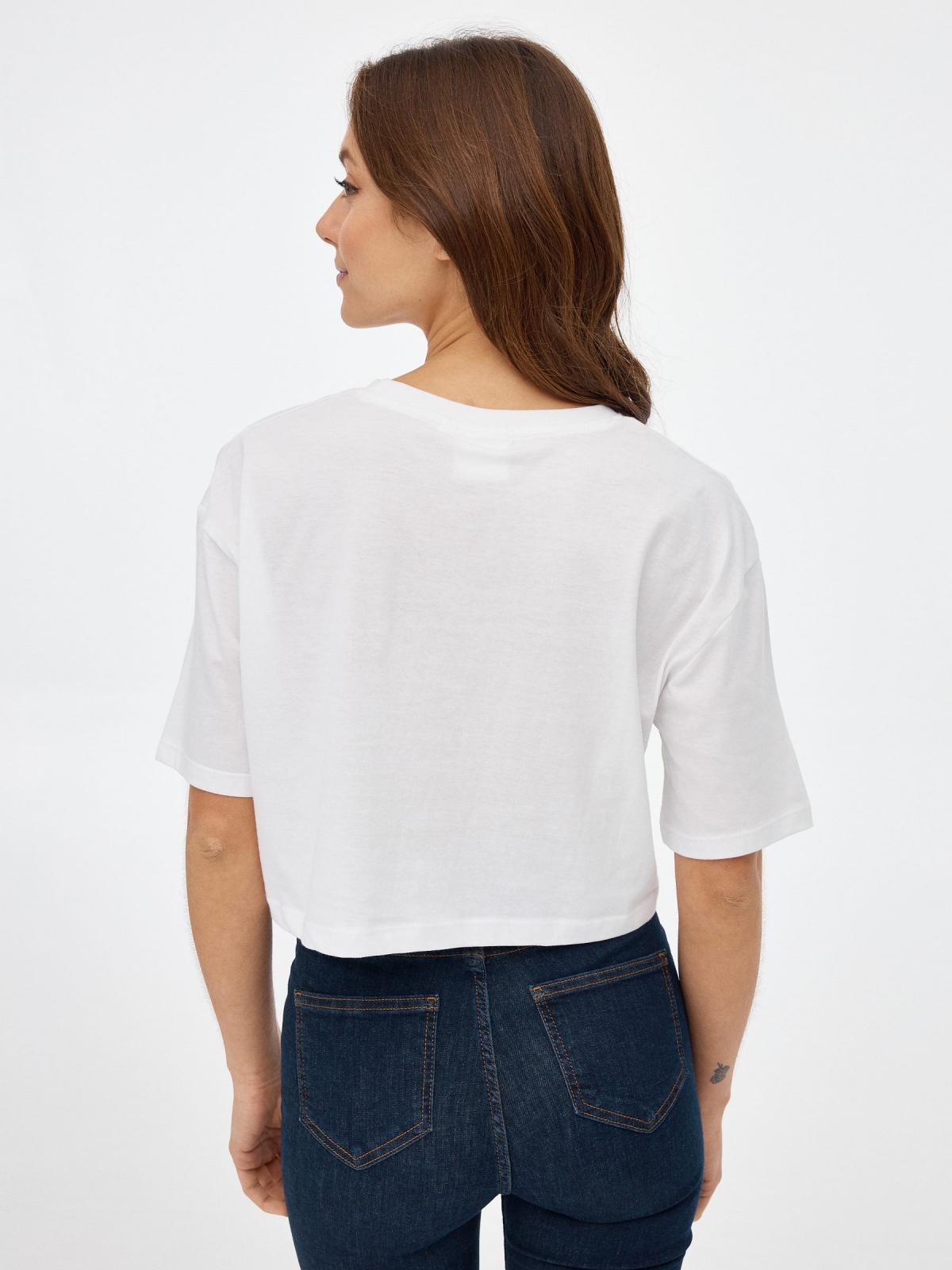 Camiseta crop Ariel blanco vista media trasera