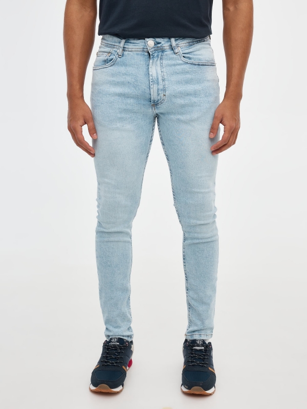 Light blue skinny jeans blue middle back view