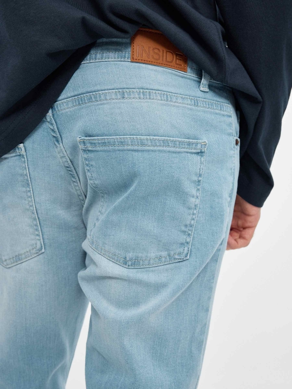 Light blue slim jeans dark blue detail view