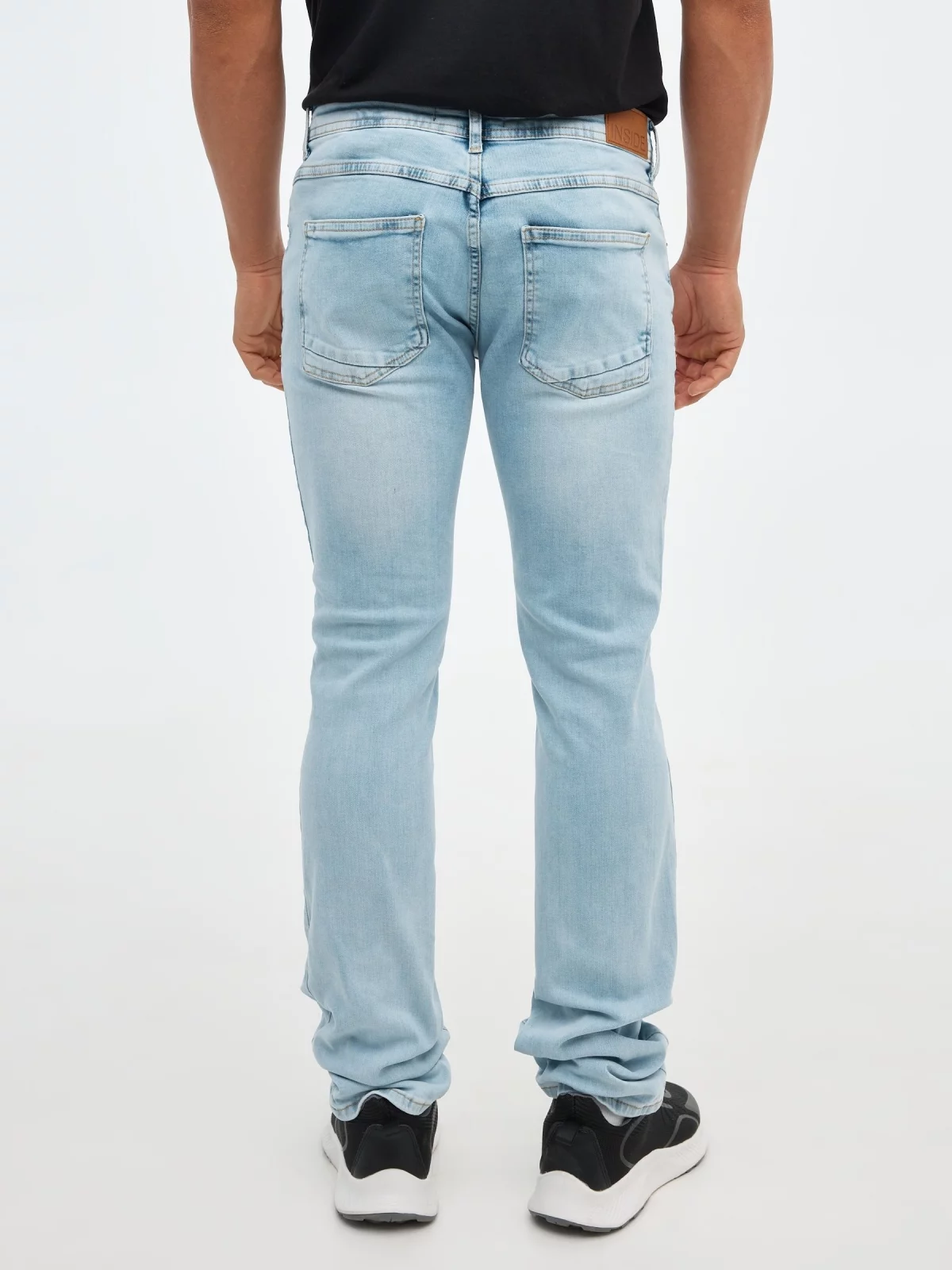Jeans regular denim rotos azul vista media trasera