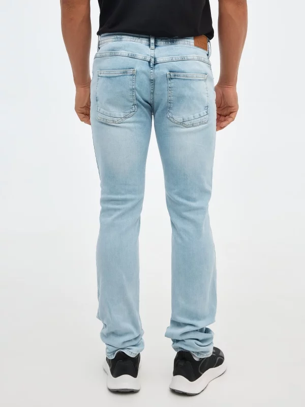 Jeans regular denim rotos azul vista media trasera