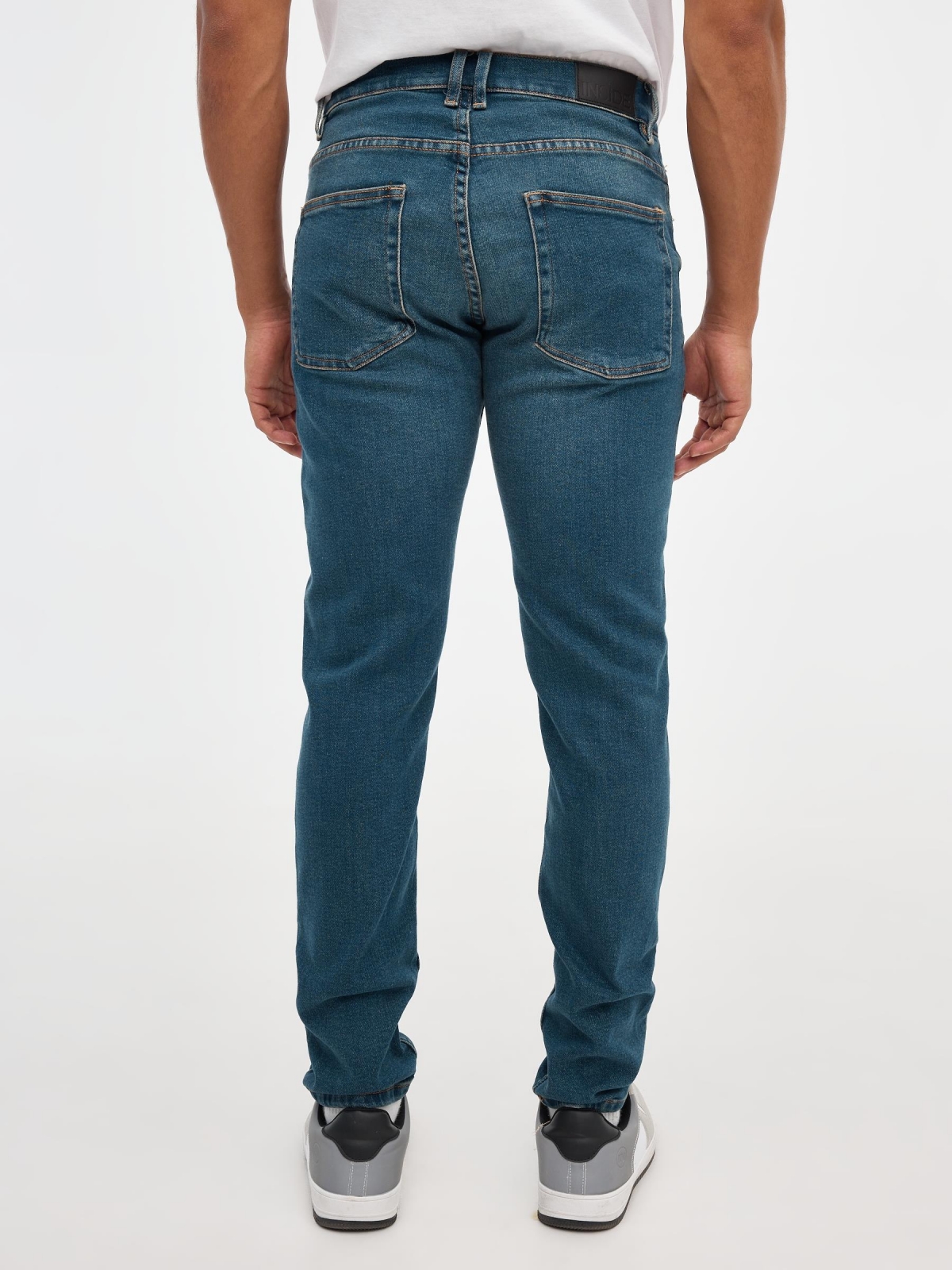 Basic slim jeans blue middle back view