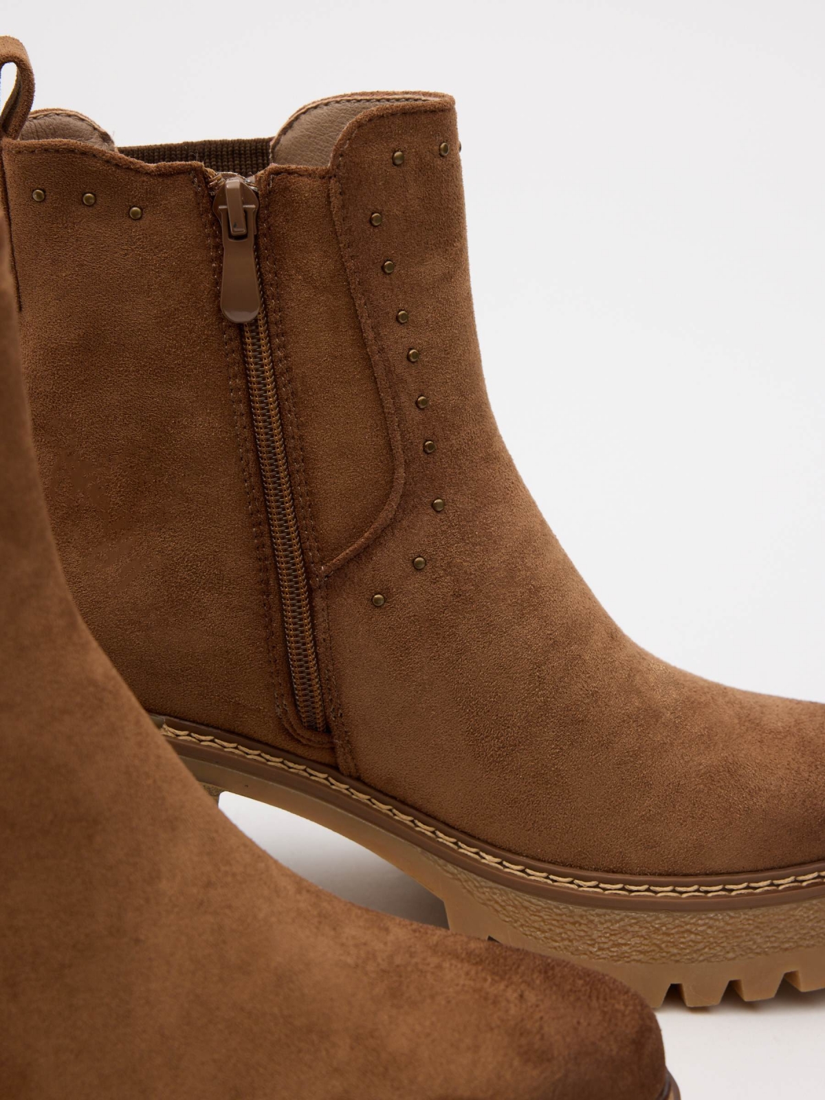 Platform ankle boots with studs brown detail view