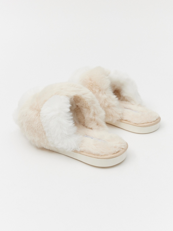 Crossed house slippers off white middle front view