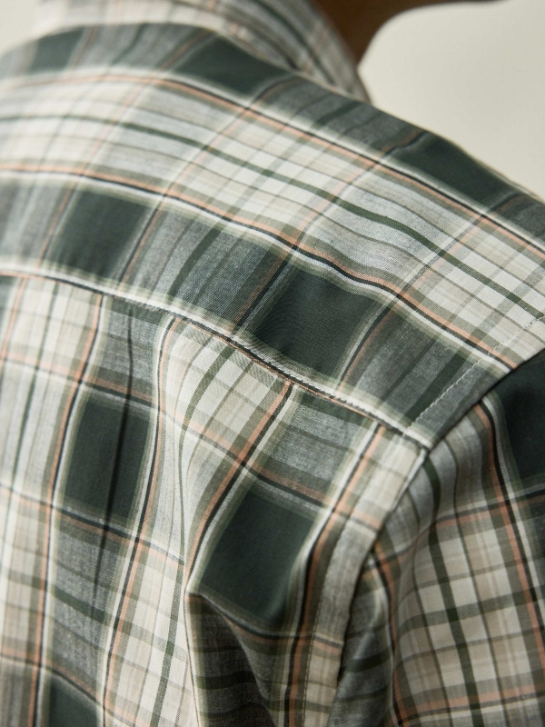 Green checkered shirt beige detail view