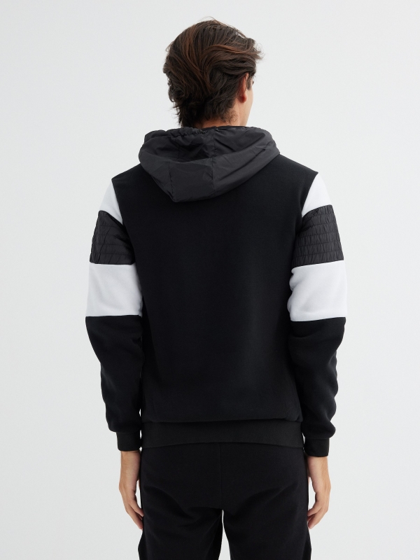 Sweatshirt color block sleeves black middle back view