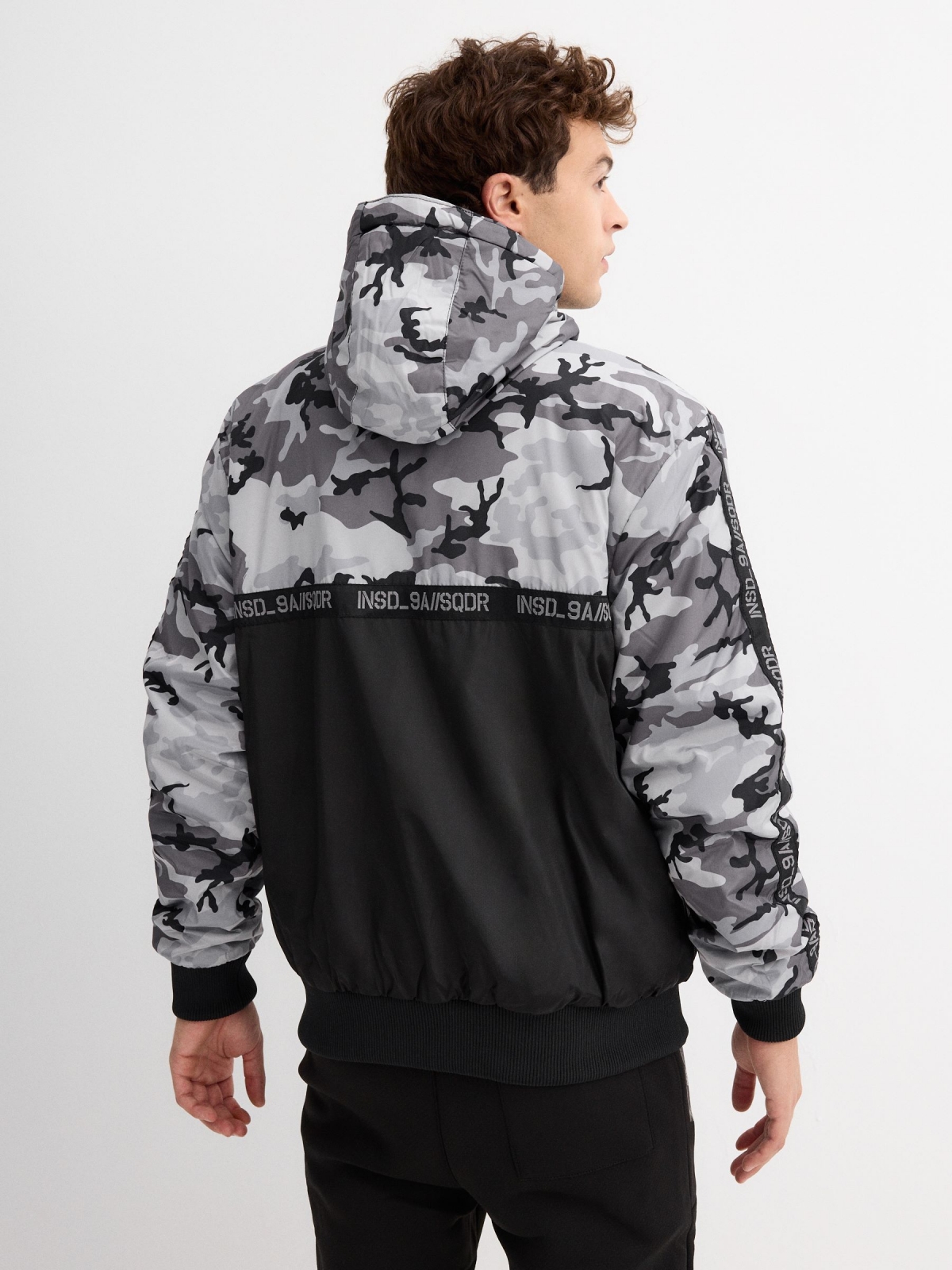 Nylon camouflage jacket black middle back view