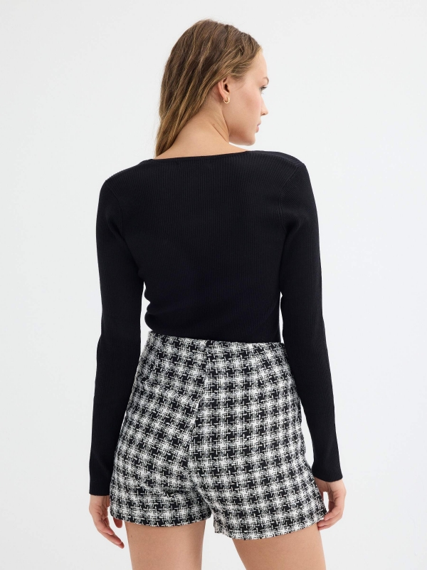 Buttoned skort black middle back view