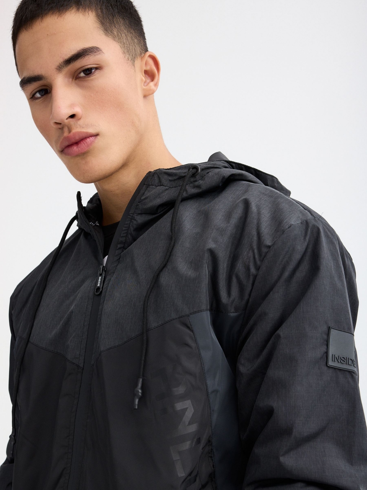 Nylon jacket colour block graphic black detail view