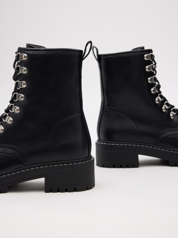 Platform and lace-up boots black detail view