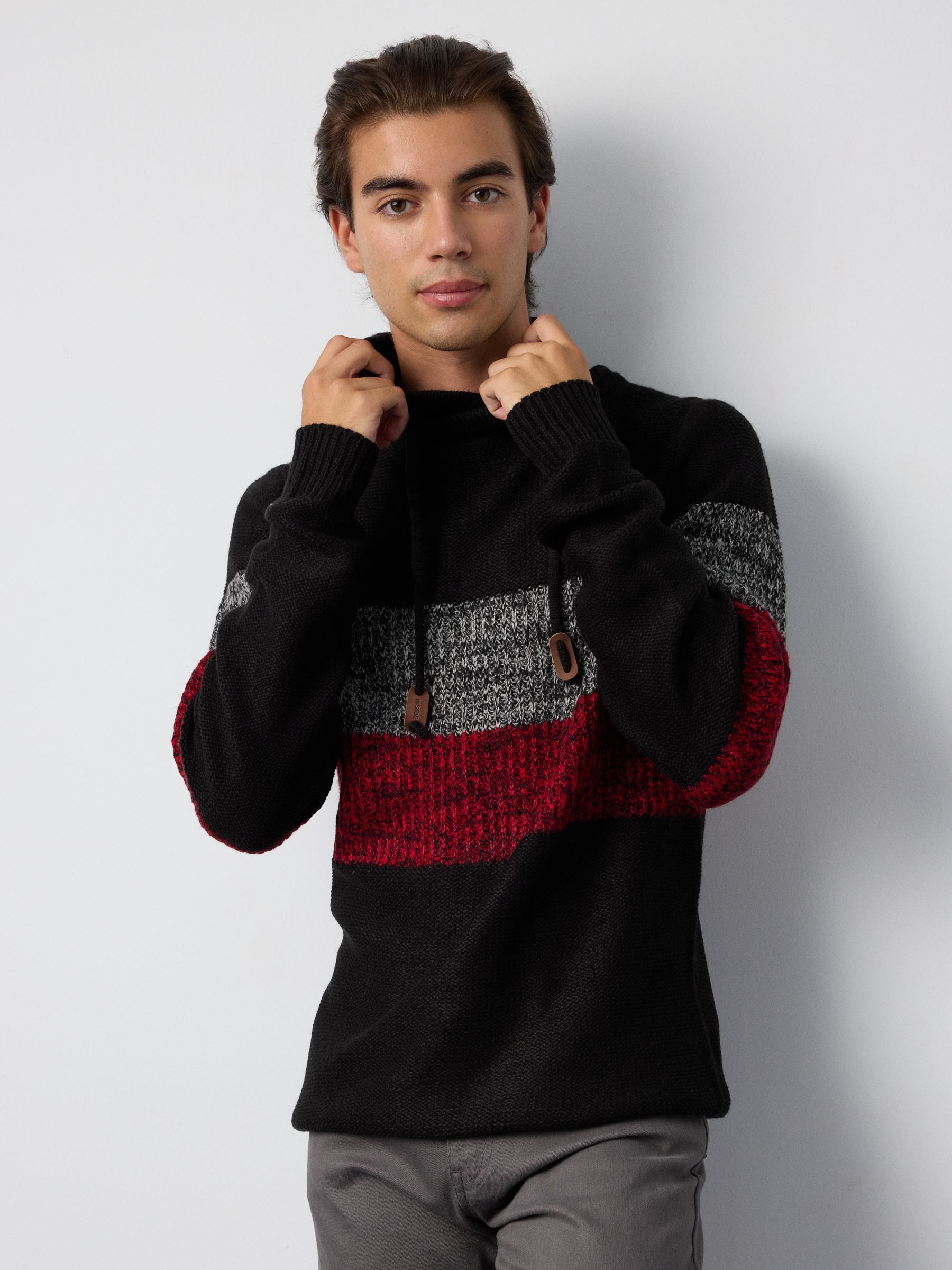 Striped jumper with laces black middle front view