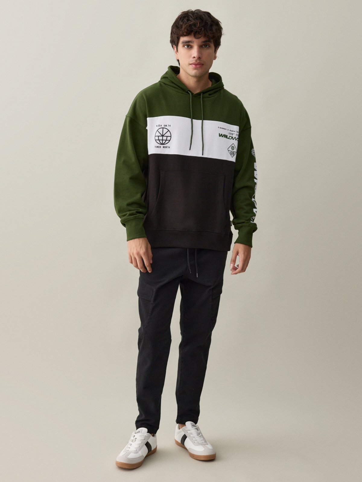 Graphic pint sweatshirt with color block dark green front view