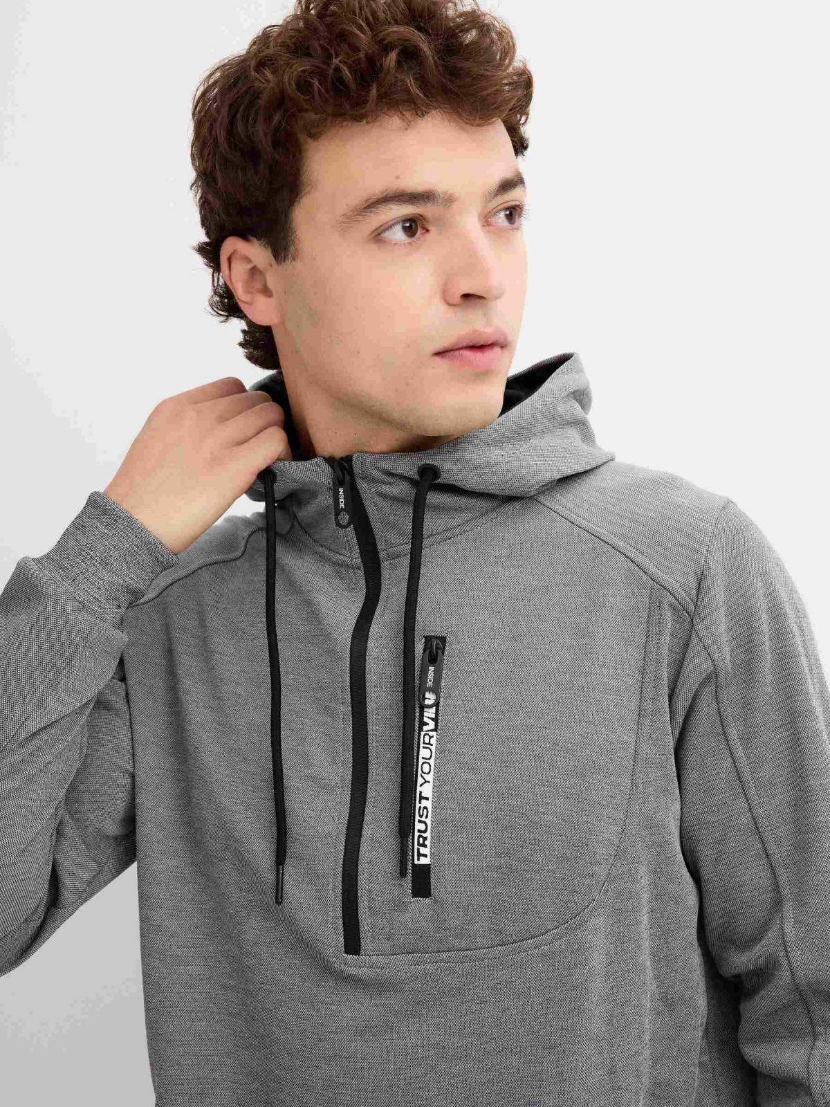 Semiclosed sweatshirt with hood grey detail view