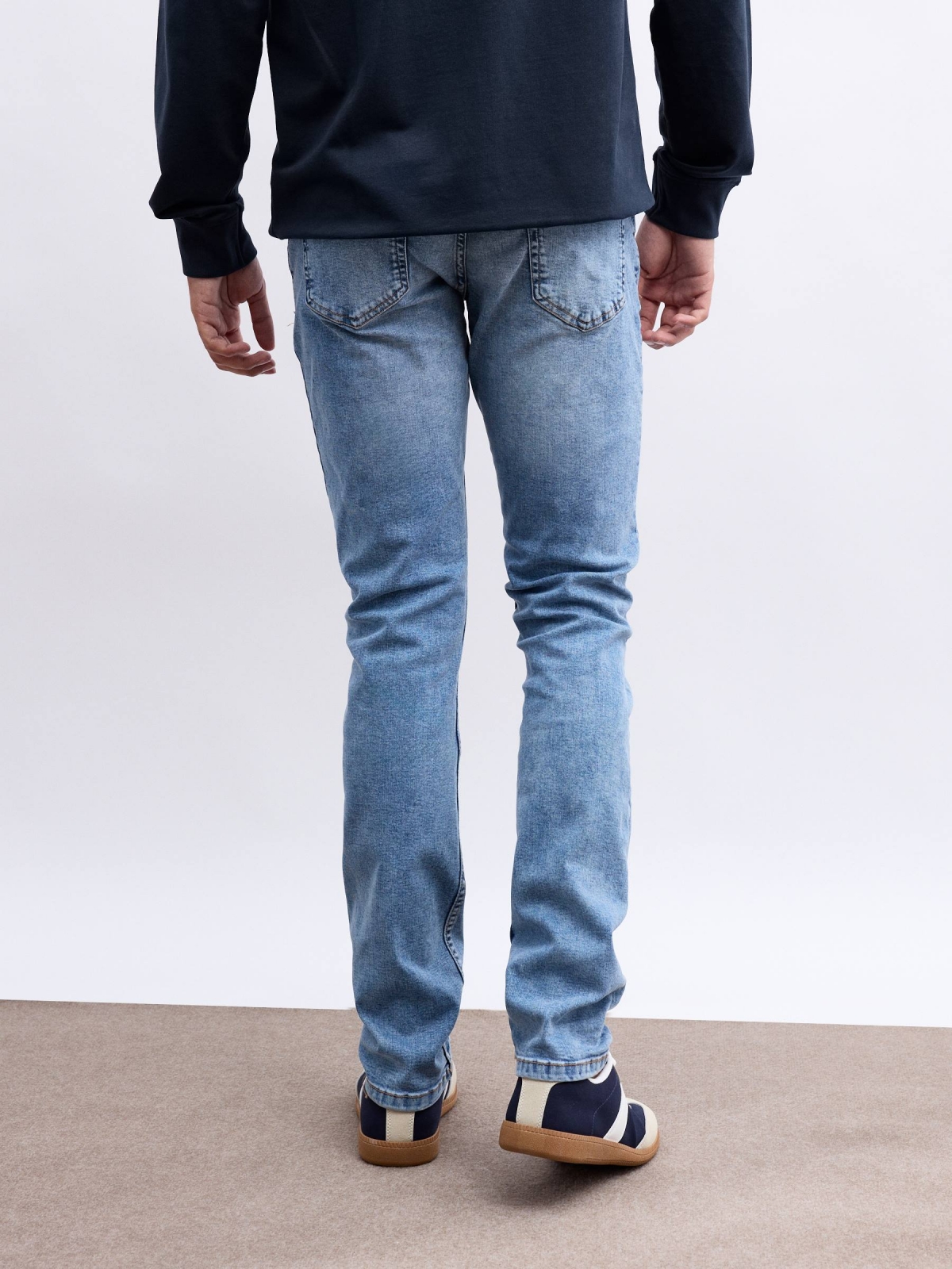 Men's basic slim jeans blue middle back view