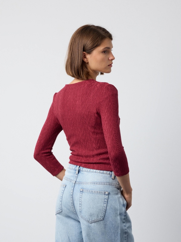 Knitted crop top with pattern garnet middle back view