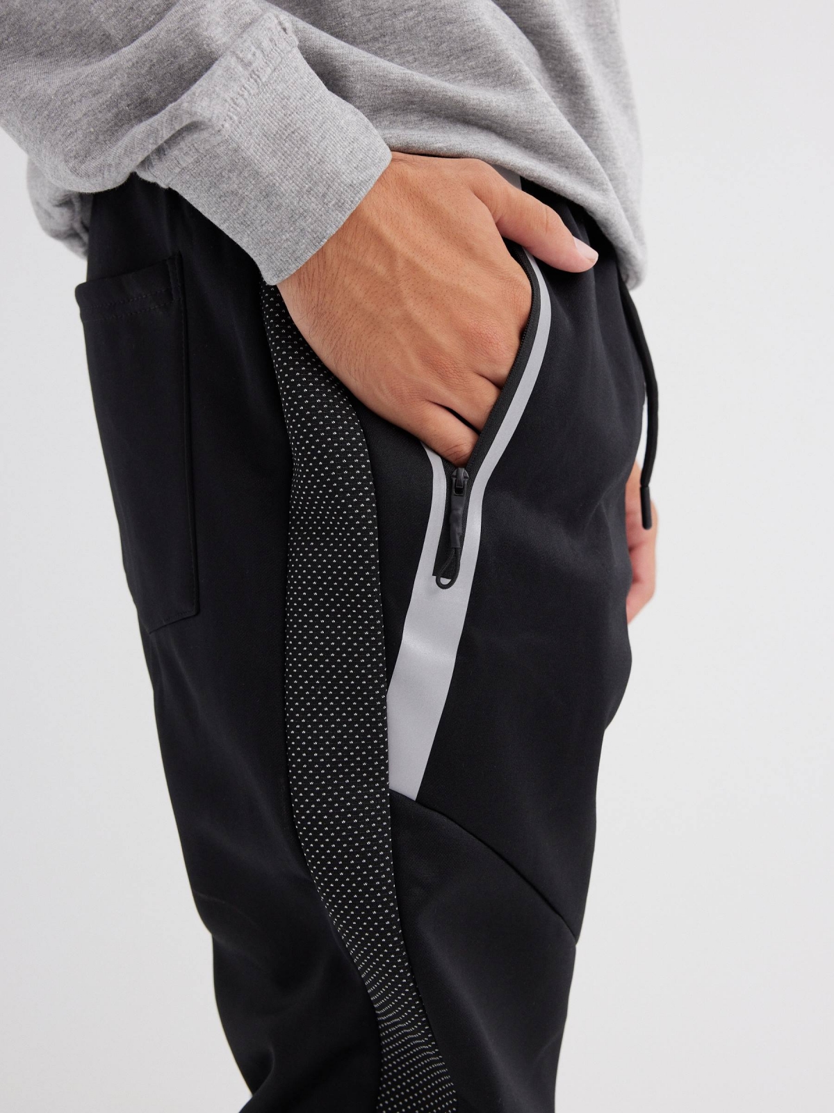 Jogger pants with contrast pockets black detail view