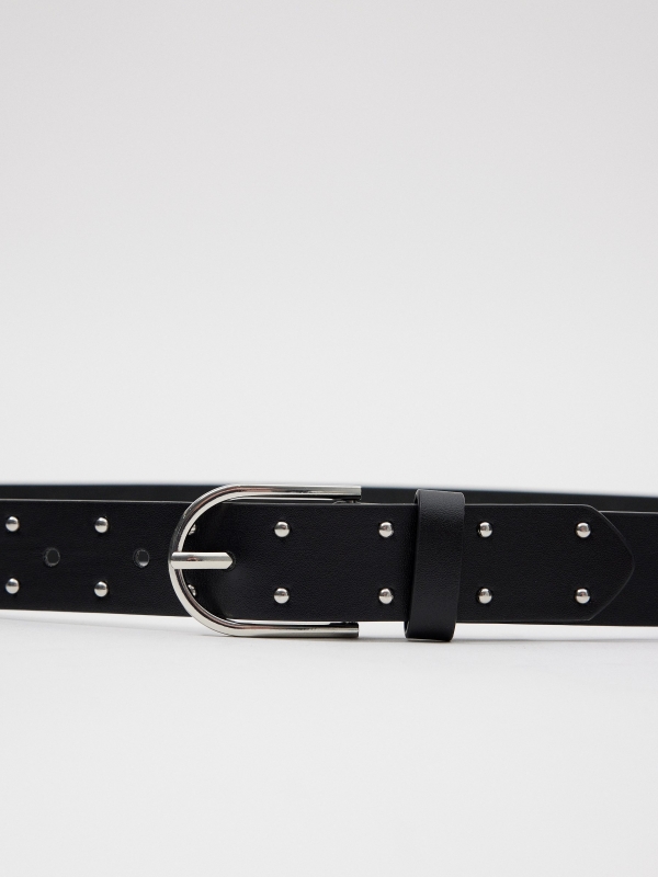 Buckle and studded belt black detail view