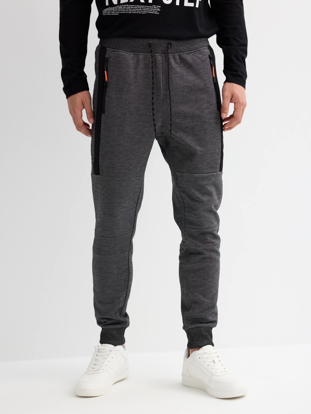 Jogger pants with zippers black middle front view