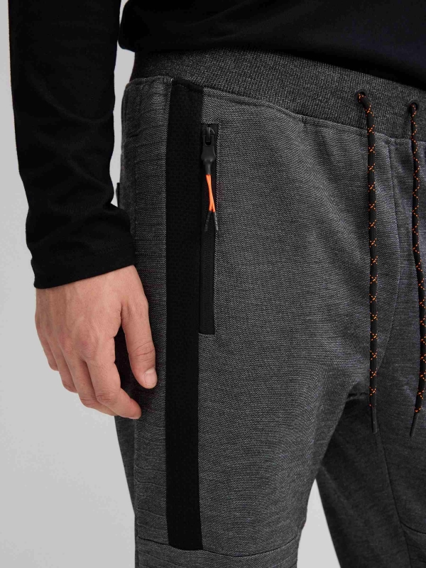 Jogger pants with zippers black detail view